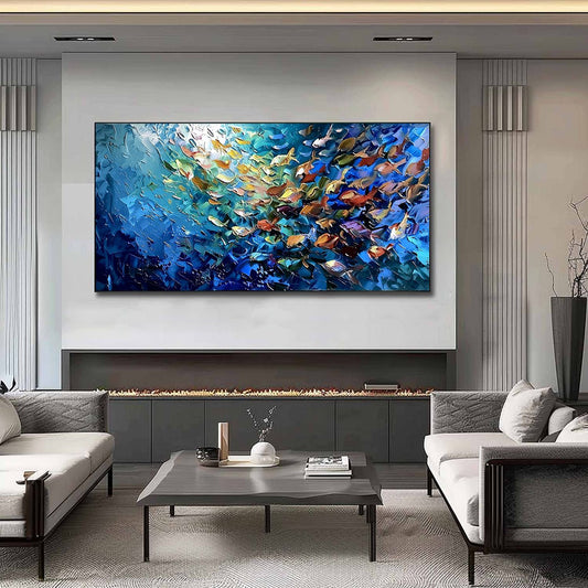 Oceanic Convergence hand-painted ocean blue, gold and orange textured school of fish painting shown as stretched canvas