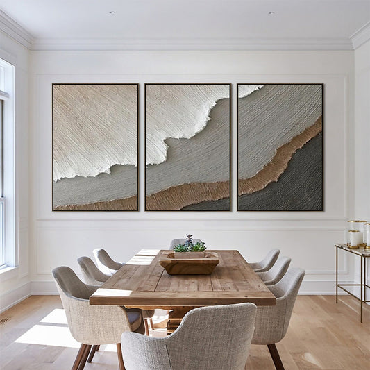 Terra Firma hand-painted beige, soft grey, charcoal and earth brown textured coastal abstract painting shown with gold frame