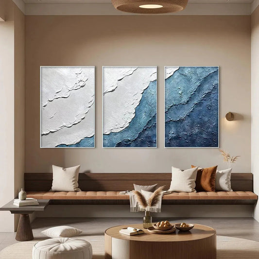 Textured Oceanscape Triptych hand-painted white and ocean blue textured coastal abstract painting shown as stretched canvas