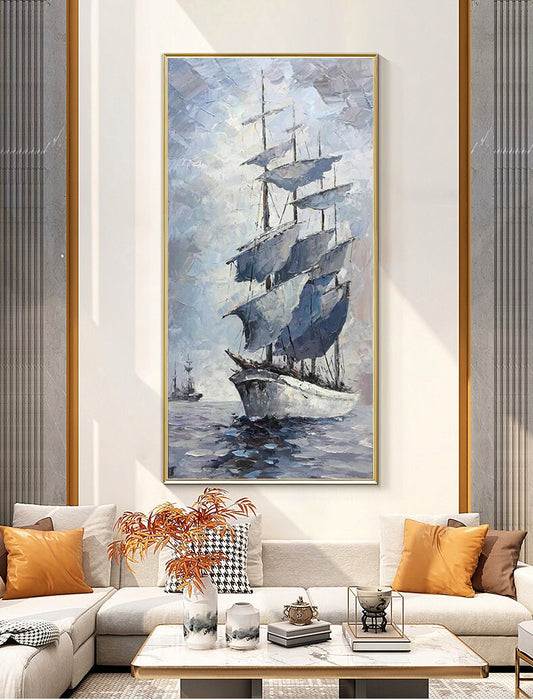 May include: A painting of a large sailing ship with white sails against a blue and gray sky. The ship is in the foreground of the painting, and the sea is in the background. The painting is framed in a gold frame.