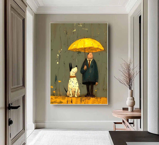 May include: A framed art print depicts a man holding a yellow umbrella, sheltering a spotted dog. The artwork features a muted color palette with a textured background. The dog is sitting, and the man is standing. The art piece is displayed in a hallway.