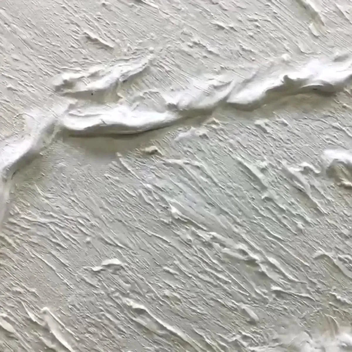 White Wave hand-painted white and beige textured ocean wave painting shown with gold frame