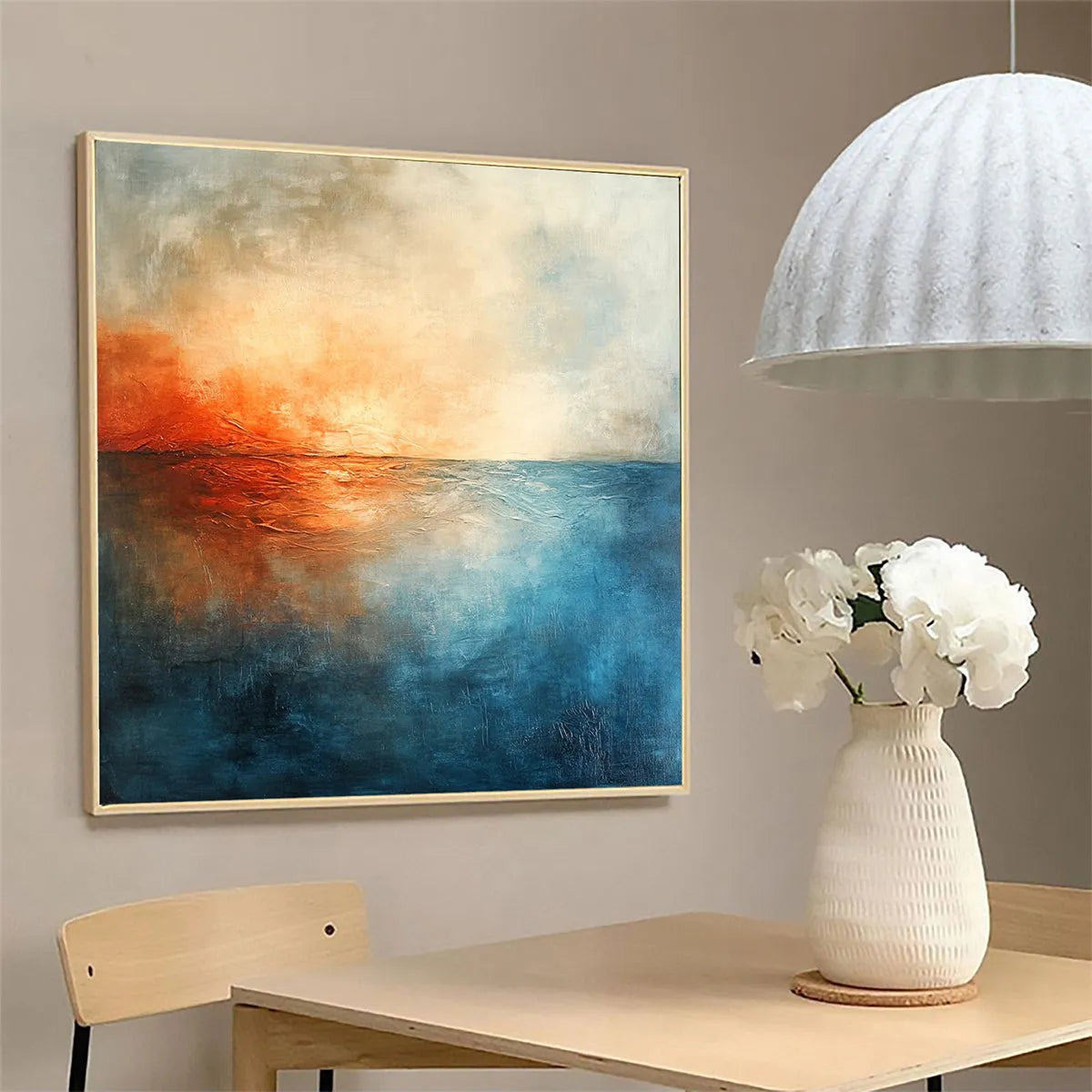 Fiery Embrace hand-painted beige and ivory textured sunset seascape painting shown with white frame