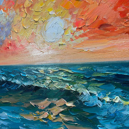 Ocean Sunset hand-painted ocean blue, ivory and soft neutral tones textured sunset seascape painting shown with gold frame