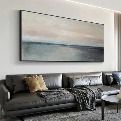 Serene Horizon hand-painted ocean blue, ivory and soft neutral tones textured coastal abstract painting shown with silver frame