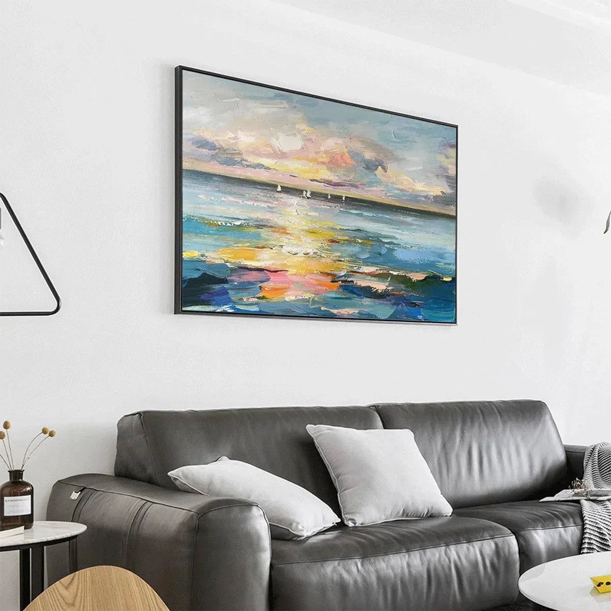 Sunset Sail hand-painted ocean blue, ivory and soft neutral tones textured sailboat seascape painting shown with black frame
