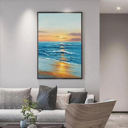 Sunkissed Shores hand-painted ocean blue, ivory and soft neutral tones textured sunset seascape painting shown with silver frame
