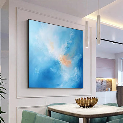 Skyscape Serenity hand-painted ocean blue and peach textured coastal abstract painting shown with gold frame