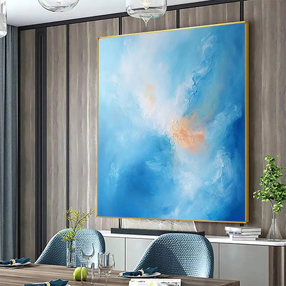 Skyscape Serenity hand-painted ocean blue and peach textured coastal abstract painting shown with wood frame