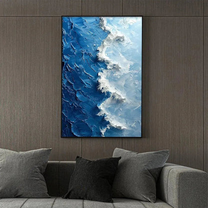 Oceanic Whispers hand-painted ocean blue and ivory textured coastal abstract painting shown with silver frame