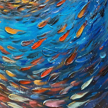 Oceanic Vortex hand-painted ocean blue, ivory and soft neutral tones textured school of fish painting shown with gold frame