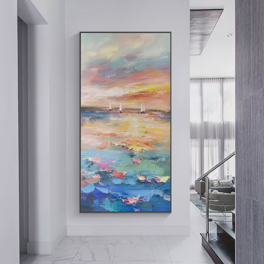 Sailing At Sunset hand-painted ocean blue, ivory and soft neutral tones textured sailboat seascape painting shown with gold frame