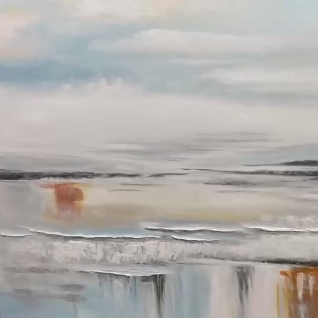 Coastal Serenity hand-painted white, soft grey, ocean blue and gold textured ocean wave painting shown with gold frame