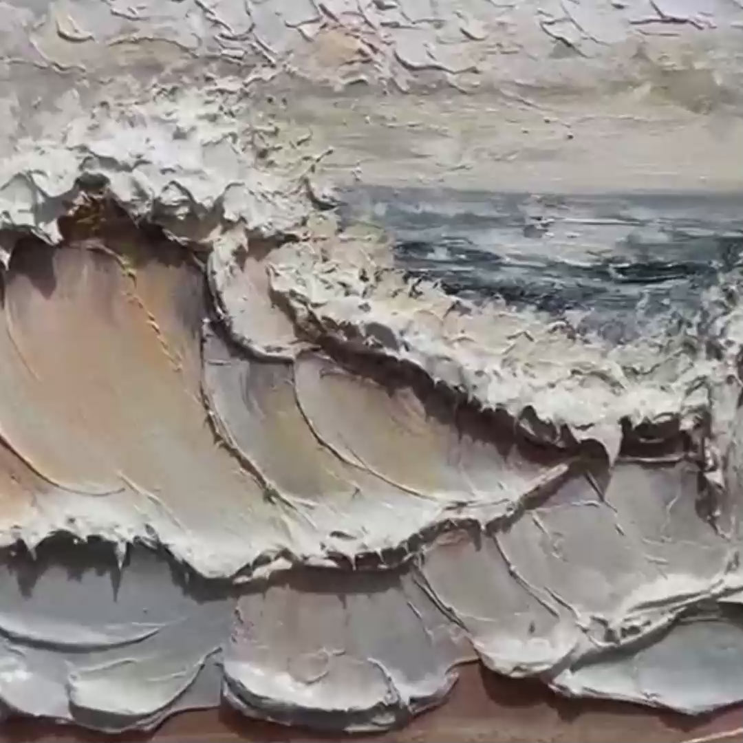 Ocean's Embrace hand-painted white, beige and soft grey textured ocean wave painting shown with gold frame