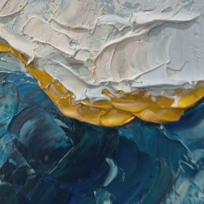 Golden Tide hand-painted gold and ivory textured ocean wave painting shown with silver frame