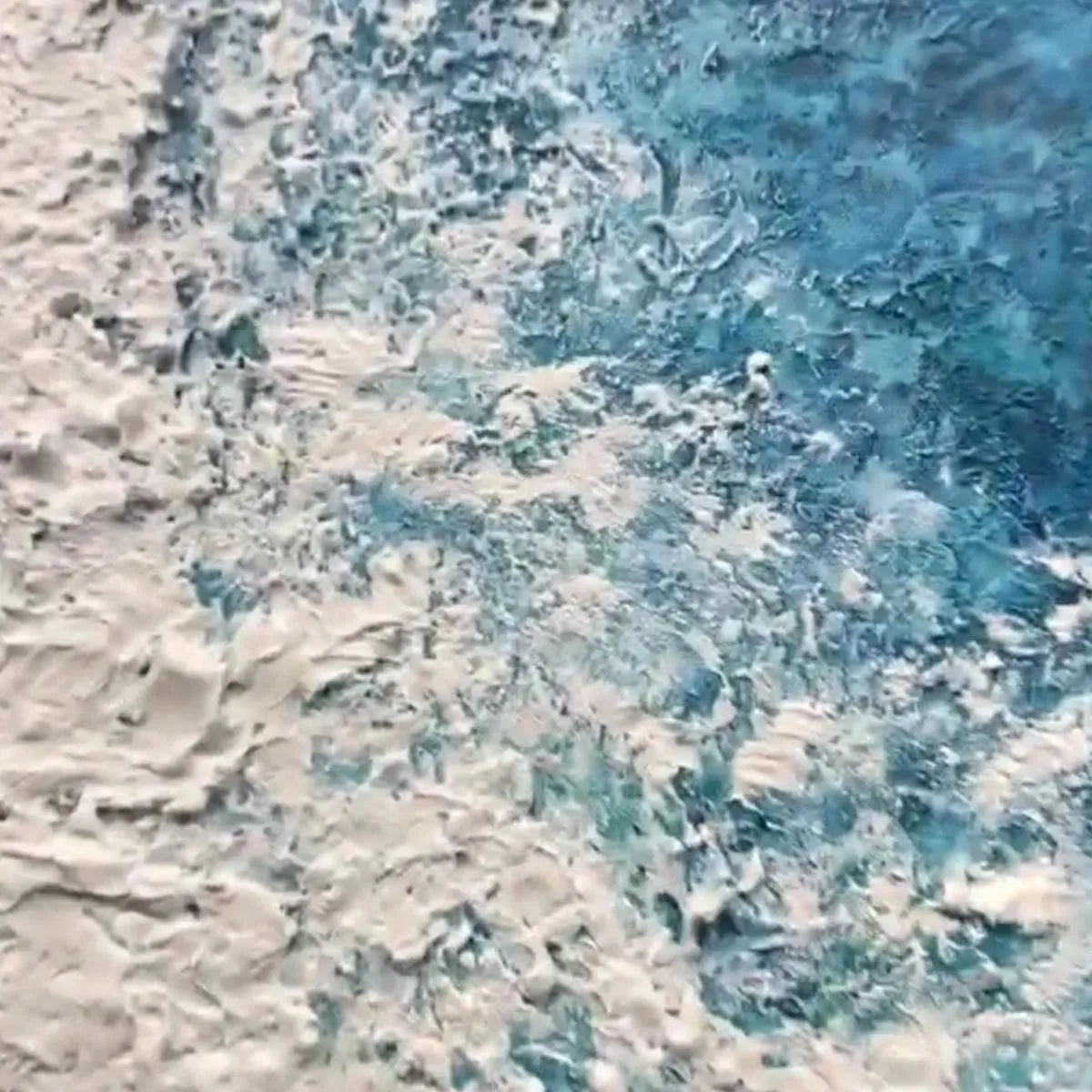 Azure Coast hand-painted beige, azure blue and ocean blue textured coastal abstract painting shown with black frame