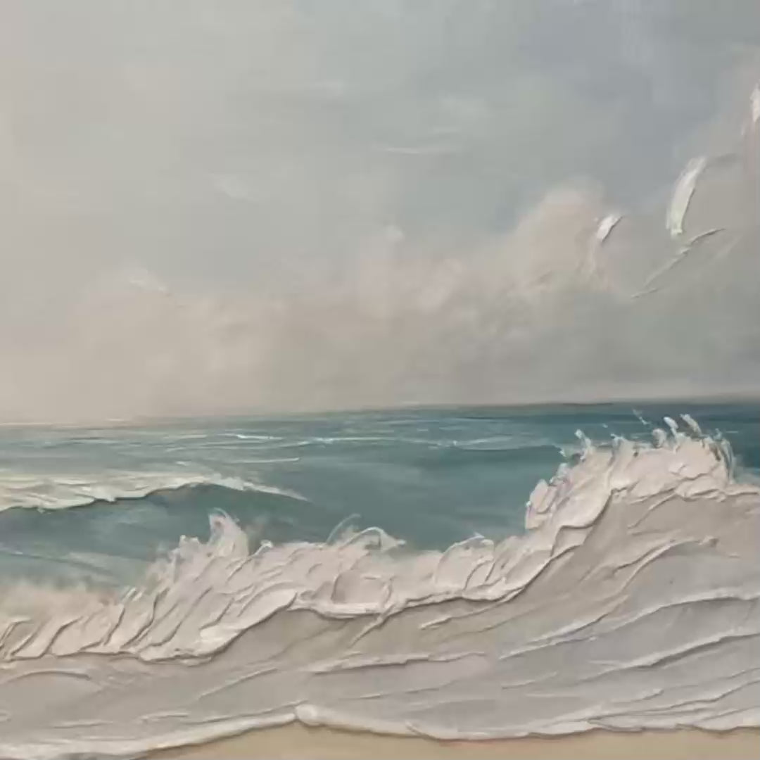 Ocean Waves hand-painted ocean blue, ivory and soft neutral tones textured seascape painting shown with gold frame