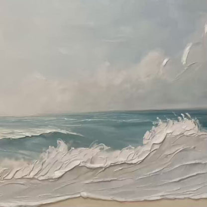Ocean Waves hand-painted ocean blue, ivory and soft neutral tones textured seascape painting shown with gold frame