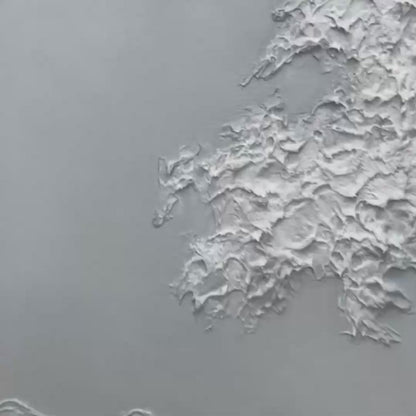 Frozen Momentum hand-painted white and soft beige textured ocean wave painting shown with gold frame