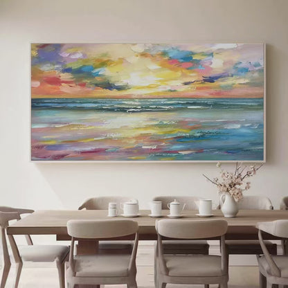 Seaside Sunset Serenade hand-painted ocean blue, ivory and soft neutral tones textured sunset seascape painting shown as stretched canvas