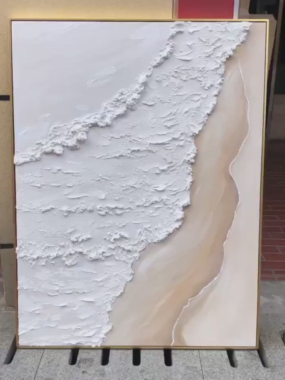 Shoreline Whispers hand-painted sand and ivory textured beach scene painting shown with silver frame