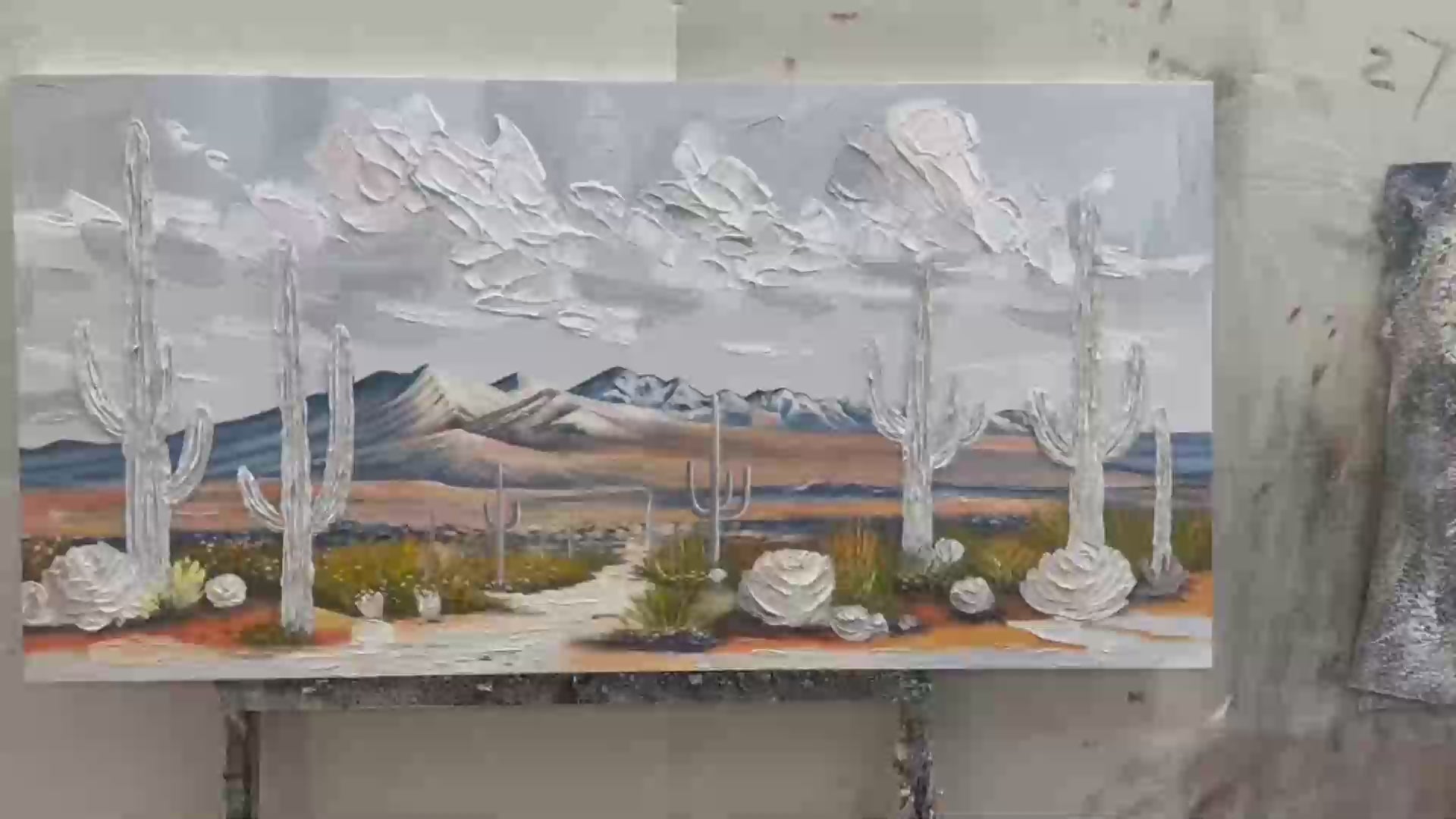 Desert Dream hand-painted terracotta, warm ochre and sand textured desert mountain landscape painting shown with silver frame