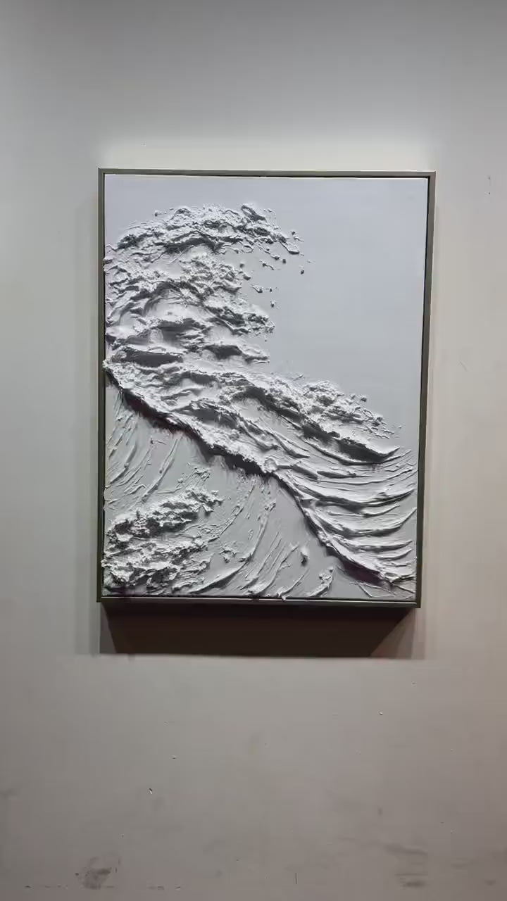 Alabaster Swell hand-painted white and soft beige textured ocean wave painting shown with gold frame