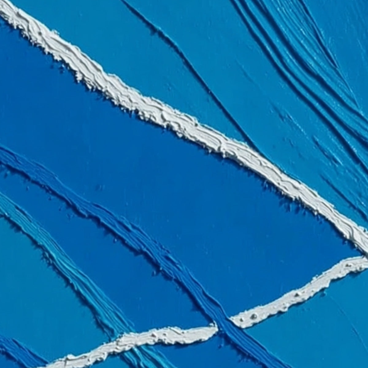 Aegean Tides hand-painted white and ocean blue textured ocean wave painting shown with gold frame