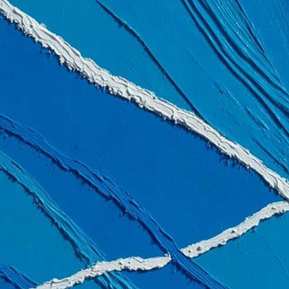 Aegean Tides hand-painted white and ocean blue textured ocean wave painting shown with gold frame