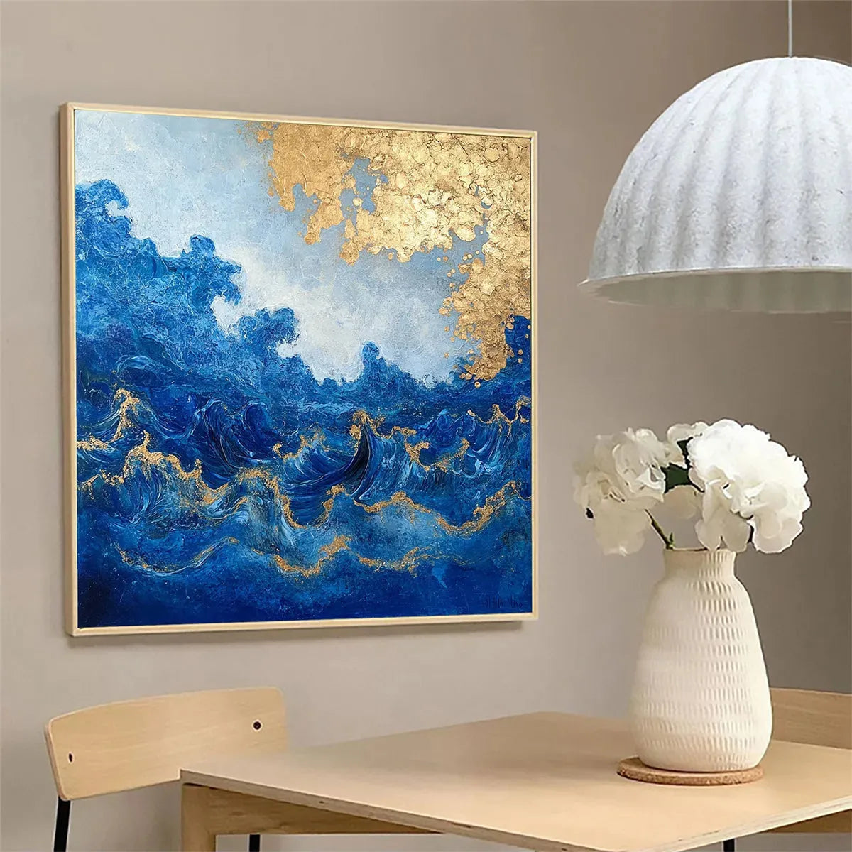 Azure Crest hand-painted azure blue and gold textured ocean wave painting shown with black frame
