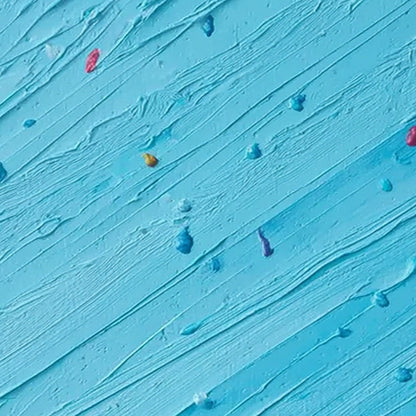 Candy Rain hand-painted ocean blue and ivory textured coastal abstract painting shown with gold frame