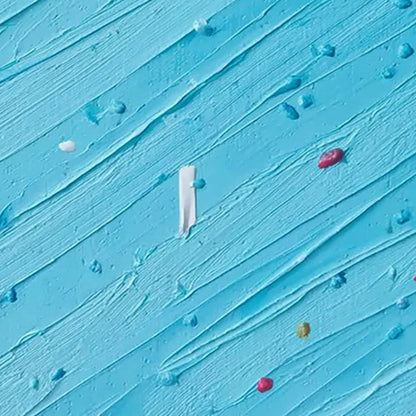 Candy Rain hand-painted ocean blue and ivory textured coastal abstract painting shown with white frame