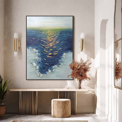 Coastal Glow hand-painted gold and ivory textured sunset seascape painting shown with black frame