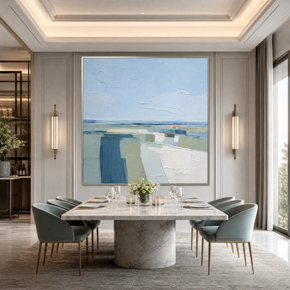 Coastal Reverie hand-painted ocean blue, ivory and soft neutral tones textured coastal landscape painting shown with white frame