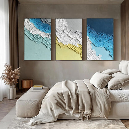 Coastal Rhythm hand-painted sand and ocean blue textured coastal abstract painting shown with silver frame