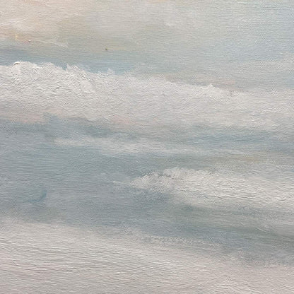 Coastal Serenity hand-painted white, soft grey, ocean blue and gold textured ocean wave painting shown with silver frame