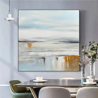 Coastal Serenity hand-painted white, soft grey, ocean blue and gold textured ocean wave painting shown as stretched canvas
