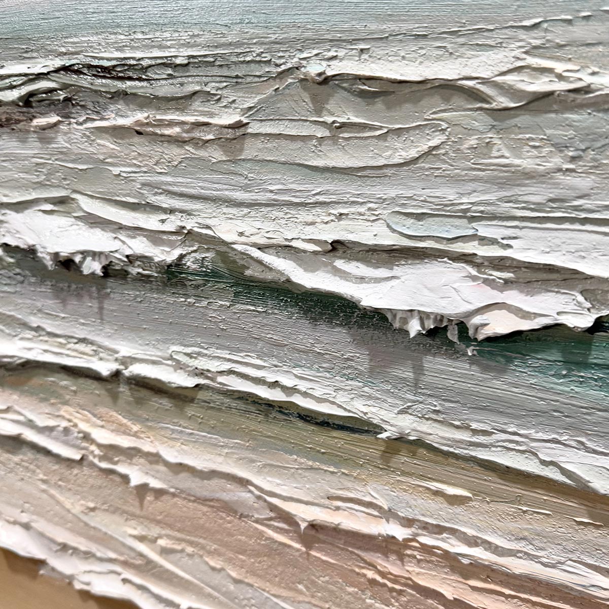Coastal Serenity hand-painted ocean blue, ivory and soft neutral tones textured seascape painting shown with silver frame