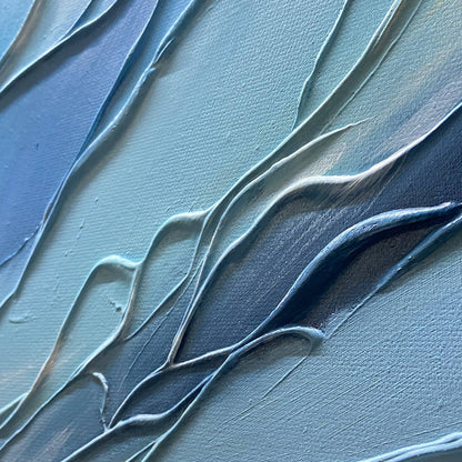 Cresting Wave hand-painted ocean blue, ivory and soft neutral tones textured ocean wave painting shown with wood frame
