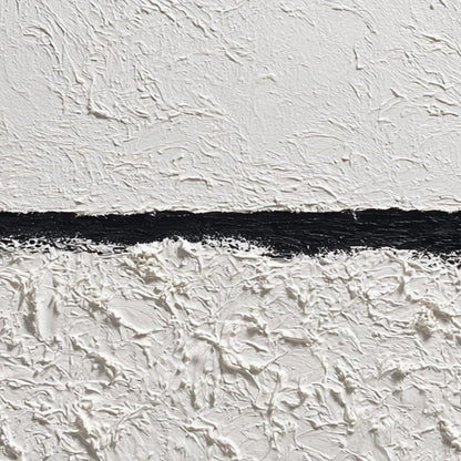 Equilibrium hand-painted white and black textured coastal abstract painting shown with gold frame