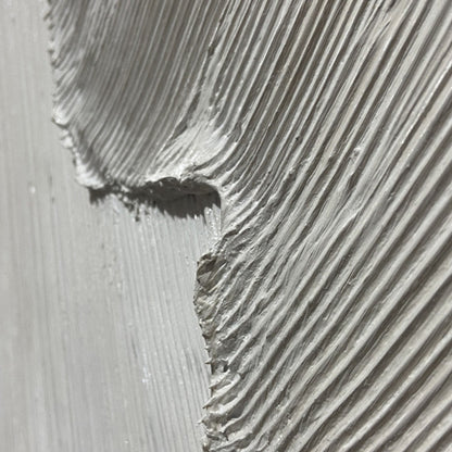 Etched In Stone hand-painted white and soft beige textured ocean wave painting shown with silver frame