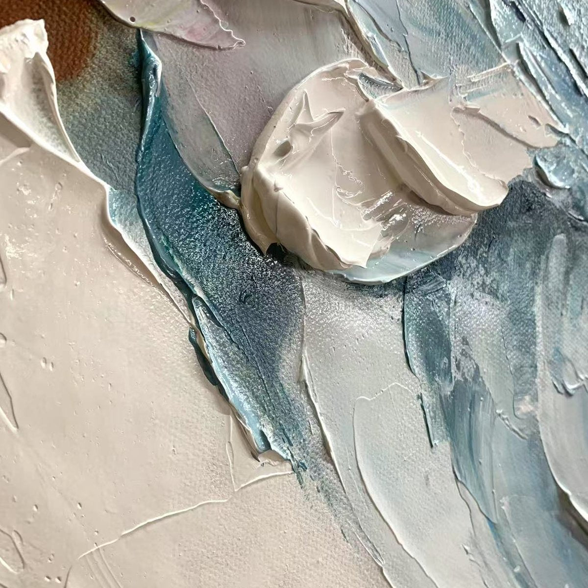 Frozen Tide hand-painted white and ocean blue textured ocean wave painting shown with wood frame