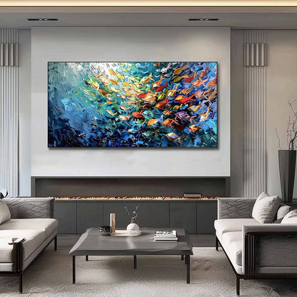 Oceanic Rush hand-painted ocean blue and ivory textured school of fish painting shown as stretched canvas