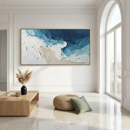 Ocean's Embrace hand-painted sand and ivory textured ocean wave painting shown with silver frame