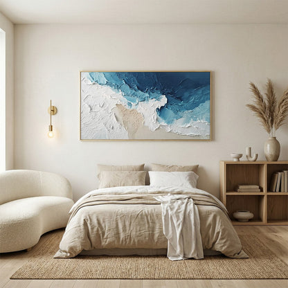 Ocean's Embrace hand-painted sand and ivory textured ocean wave painting shown with black frame