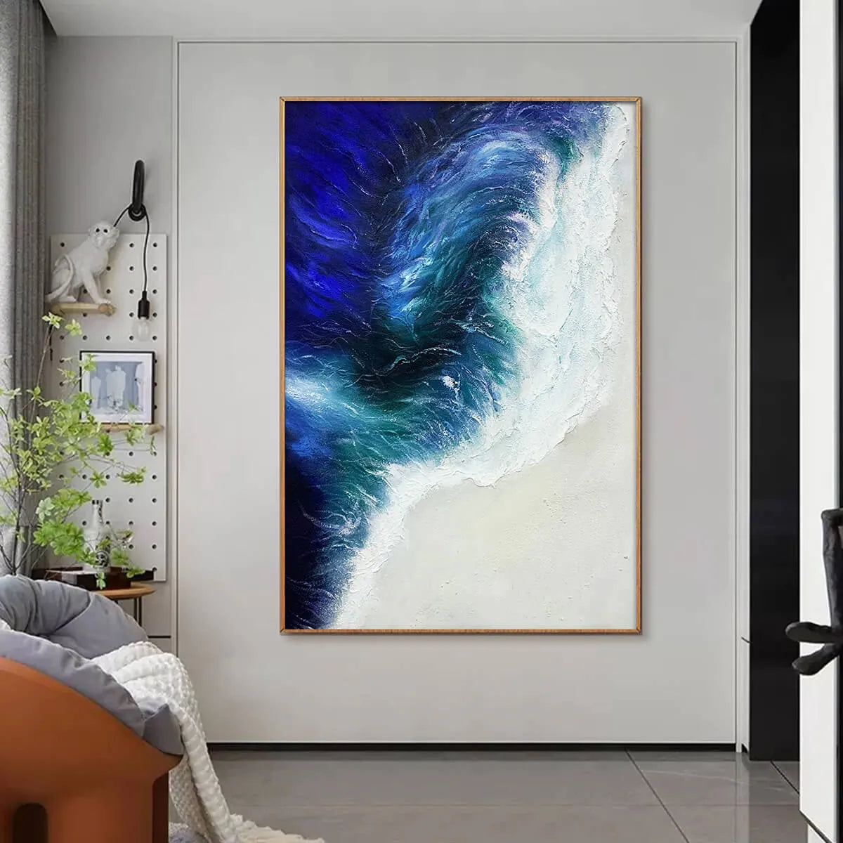 Ocean's Embrace hand-painted ocean blue, ivory and soft neutral tones textured seascape painting shown with black frame