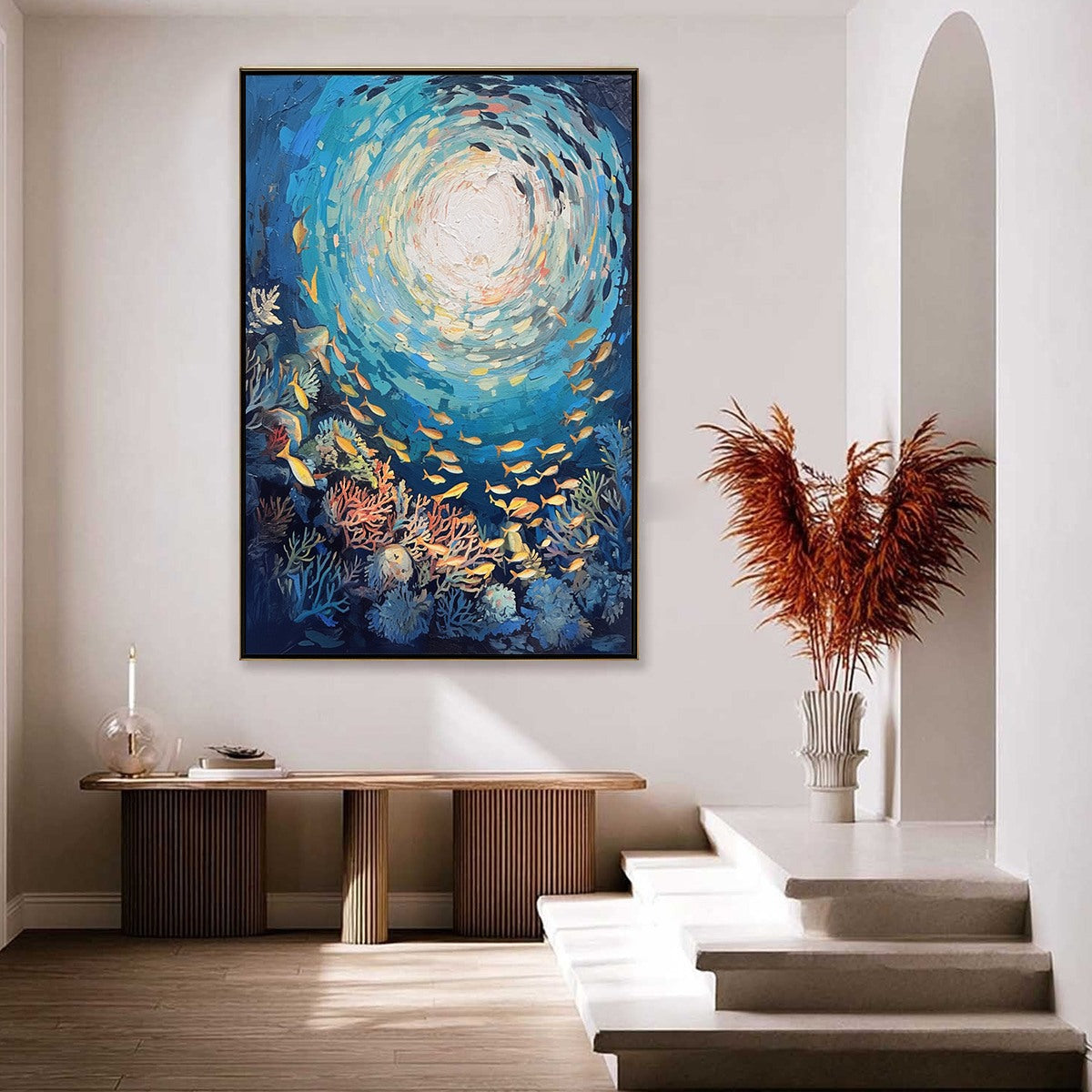 Ocean’s Grace hand-painted gold and coral textured school of fish painting shown with black frame
