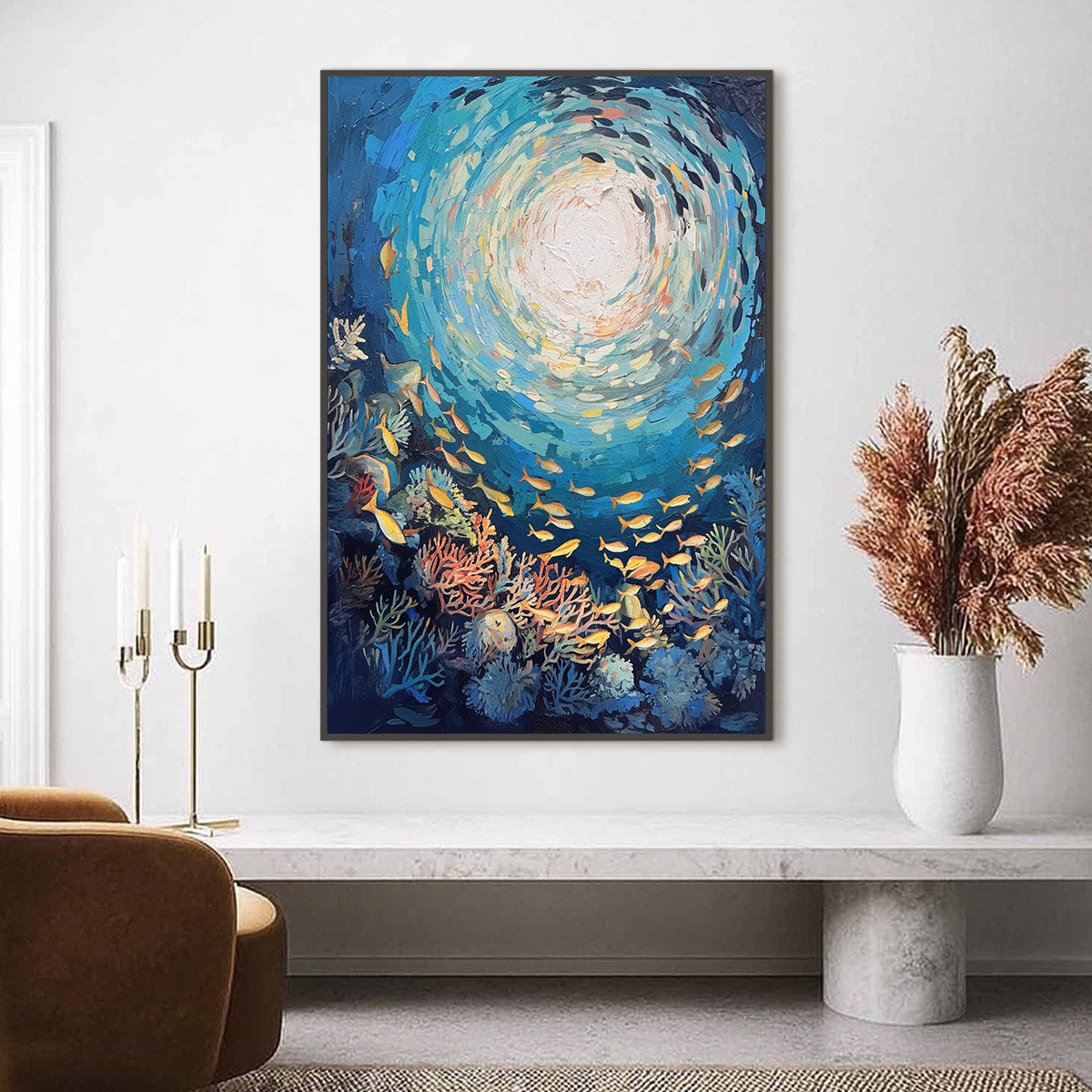 Ocean’s Grace hand-painted gold and coral textured school of fish painting shown with white frame