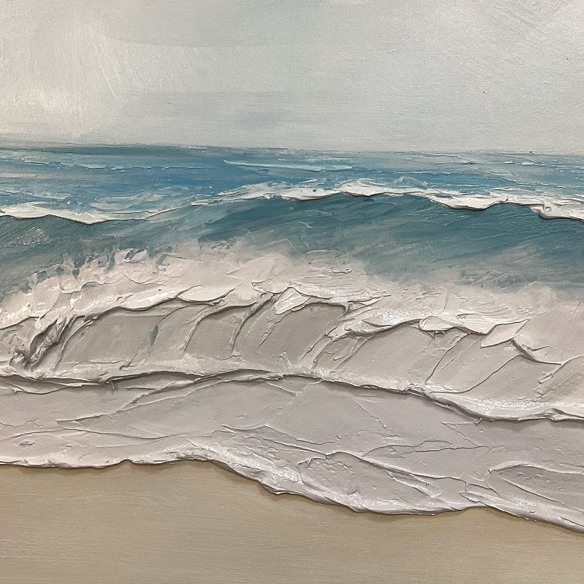 Ocean Waves hand-painted ocean blue, ivory and soft neutral tones textured seascape painting shown with black frame