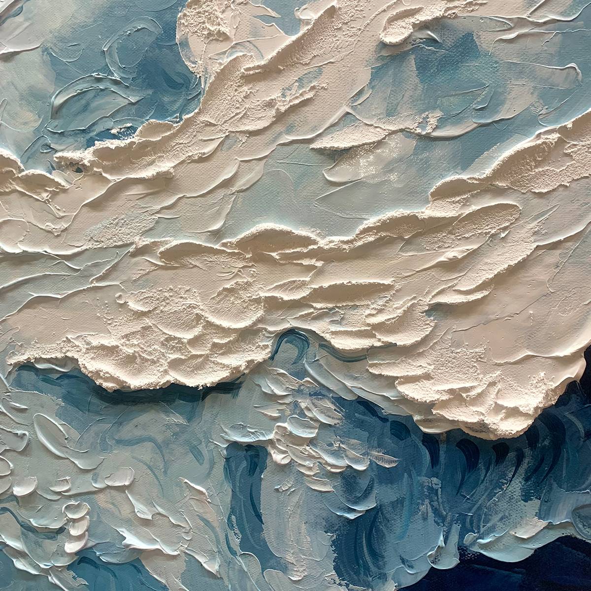 Ocean's Embrace hand-painted white and ocean blue textured coastal abstract painting shown with silver frame